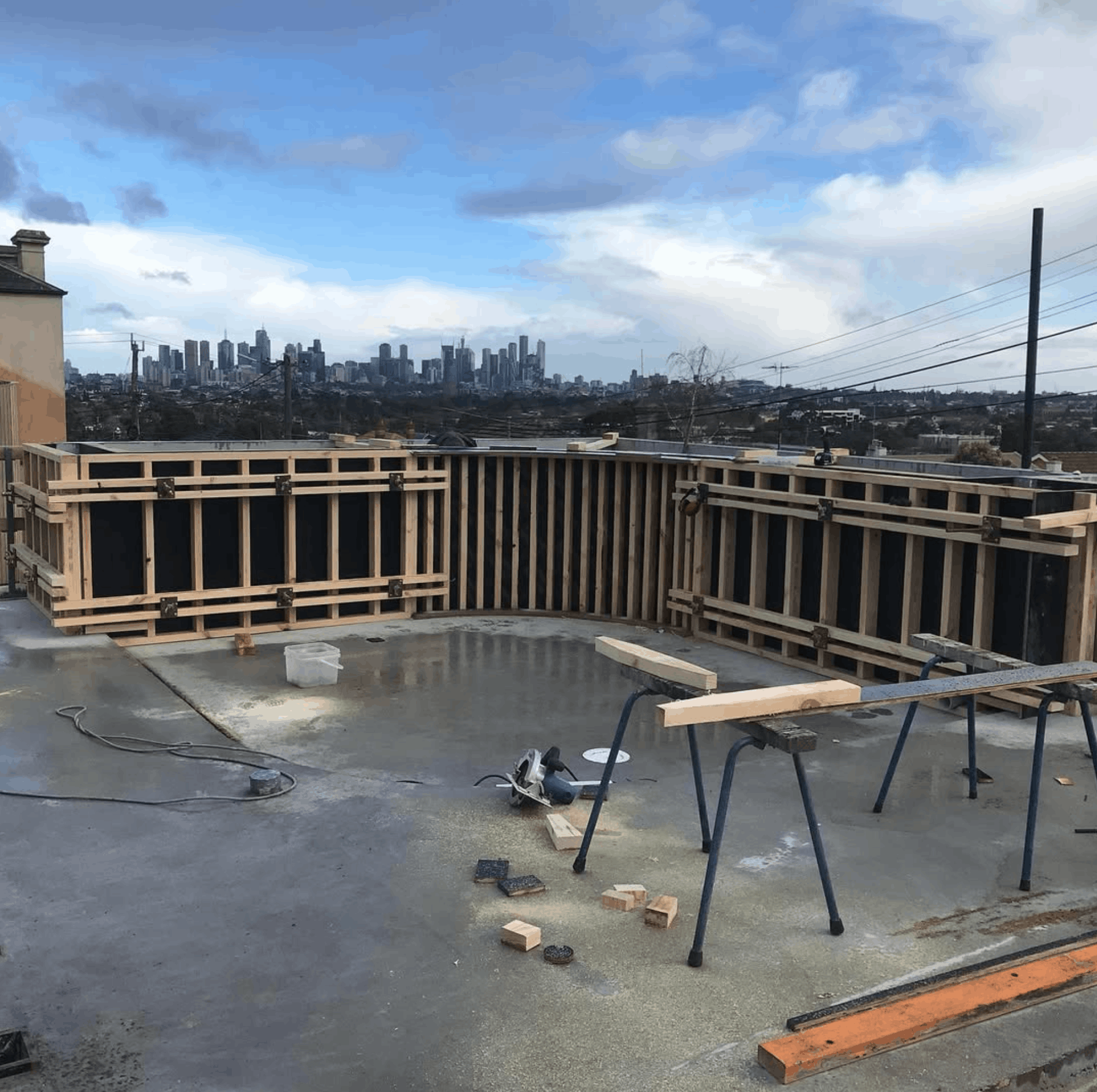 Curved structural formwork carpentry on a Melbourne rooftop build